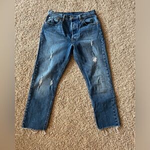 Levi’s 501 distressed cropped skinny jeans. Size 28, unfinished hem.